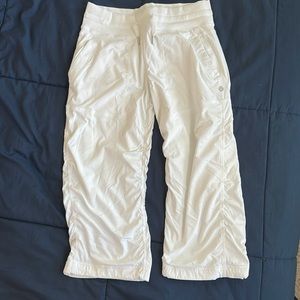 Women’s size 4 lined white Lululemon cropped studio pants.